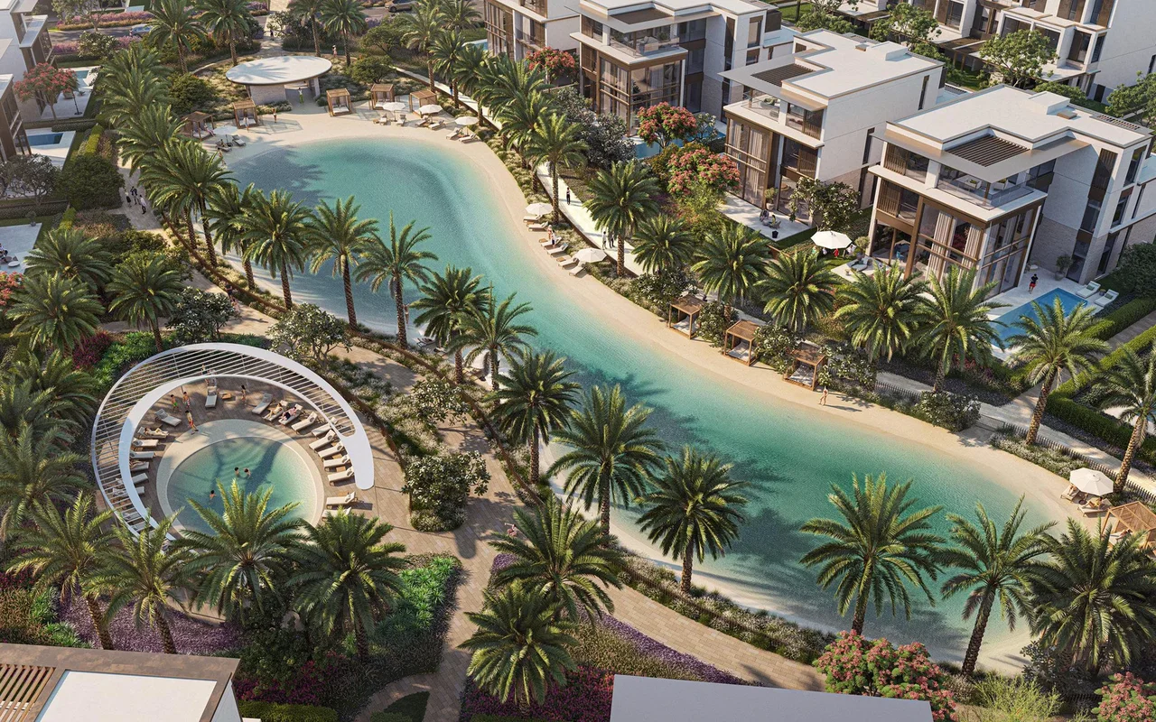 New gated residence Nad al Sheba Gardens with a lagoon and a swimming pool close to highways, Na ...